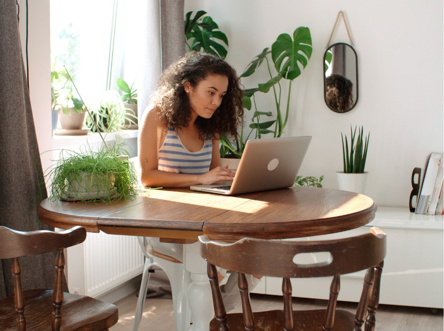 Young female studying in her apartment